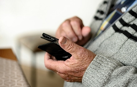elderly using mobile phone